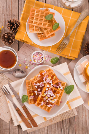 Waffles with jam and confetti.の写真素材