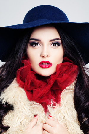 Glamorous Woman. Female Face. Makeup and Curly Hairstyleの写真素材