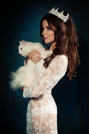 Elegant Woman Fashion Model with Curly Hair Style.の写真素材