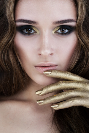 Beautiful Female Face. Glamorous Woman with Makeupの写真素材