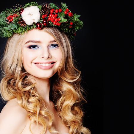 Happy Woman with Cute Smile and Healthy Curly Hairの写真素材
