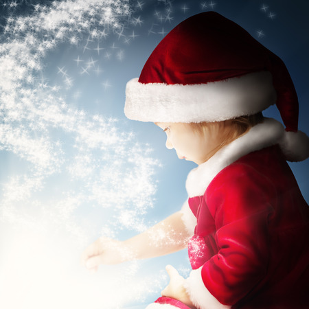 Christmas Fantasy Background with Baby and Star Lightの写真素材