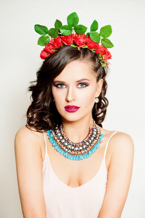 Fashion Portrait of Beautiful Girl. Young Woman with Makeup and Fashion Hairstyleの写真素材
