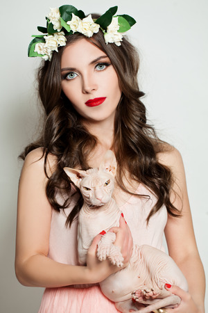Fashion Woman and Cat. Beauty Portraitの写真素材