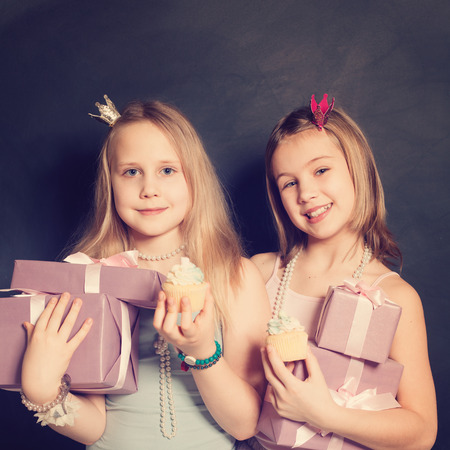 Young girls with gift boxの写真素材