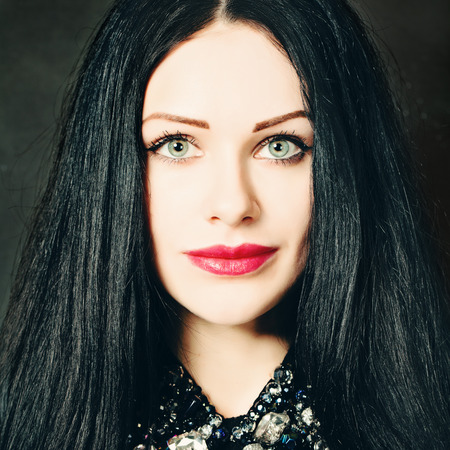Brunette Woman. Beautiful Face Closeup