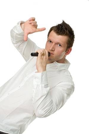 Young Man with Microphone Isolated on Whiteの写真素材