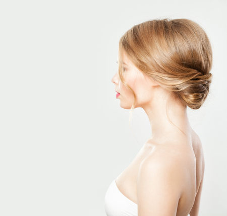 Young Woman with Blonde Hair with Wedding Hairstyle