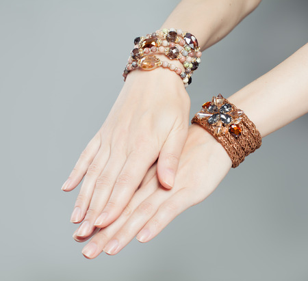 Beautiful woman hands with jewelry bracelet closeupの写真素材