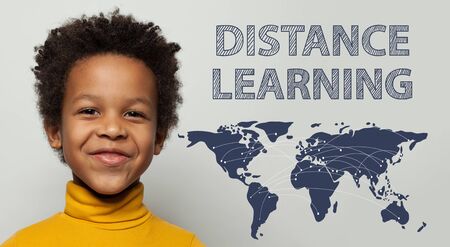 Distance learning. Small African American black child boy portrait