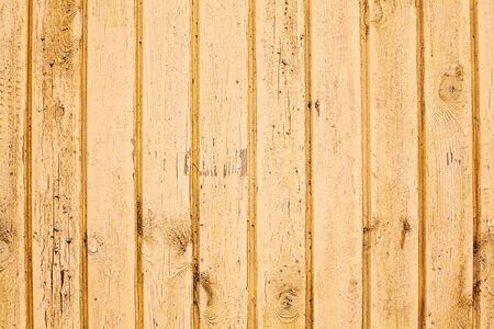 Rustic Old yellow wooden background. wood planks.