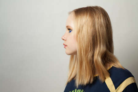 Girl with black eyeliner makeup in day lightの写真素材