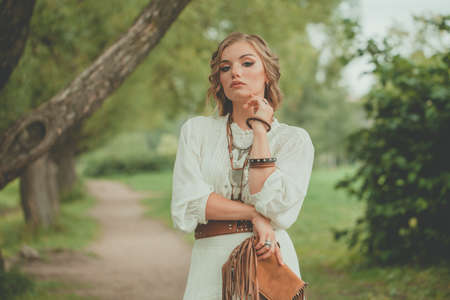 Attractive young woman outdoor portraitの写真素材