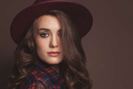 Portrait of nice woman wearing fedora hatの写真素材