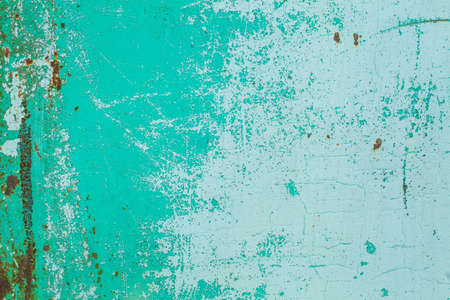Old green grunge rusty iron wall backgroundの写真素材