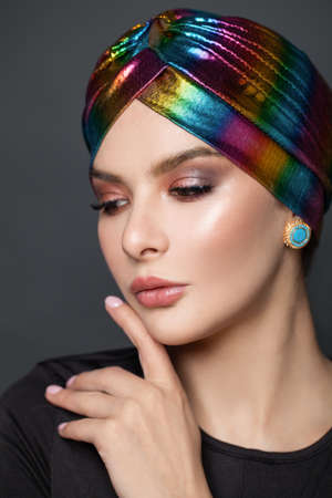 Close up female model face. Perfect woman in turbanの写真素材