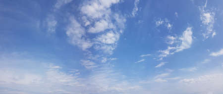 White clouds on blue sky background