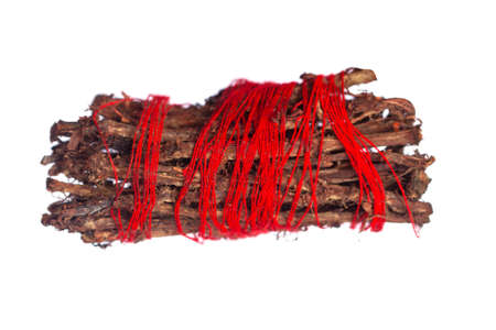 Root of Rubia tinctorum for medical use, eating or coloring isolated on white background.の写真素材