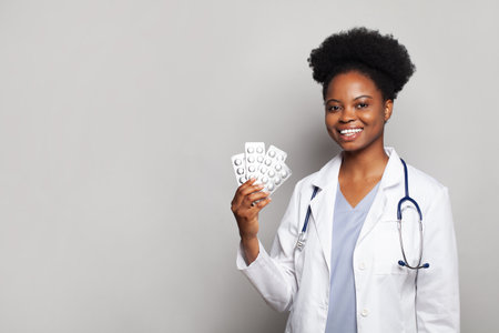 Confident doctor or physician recommend pills medical prescription. health care and medicine conceptの写真素材