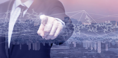 Businessman hand pointing icon. Communication, technology, IoT, internet, global, futuristic conceptの写真素材