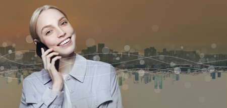 Blonde businesswoman talking on smartphone on city background. Communication, technology, IoT,...