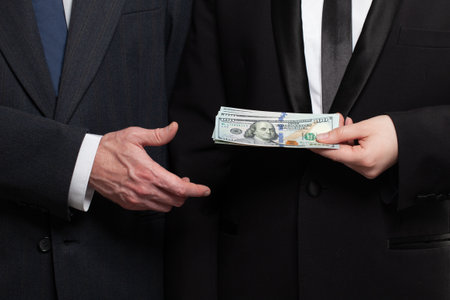 Businessmen giving money cash us dollar banknote, deal, salary and credit concept