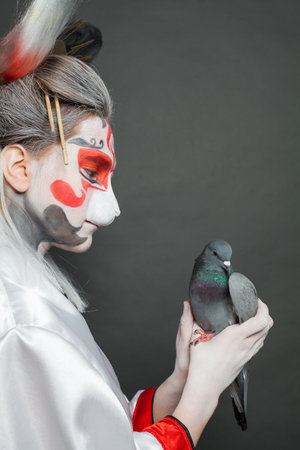 Beautiful mask theater actress portrait. Movie or Halloween imageの写真素材