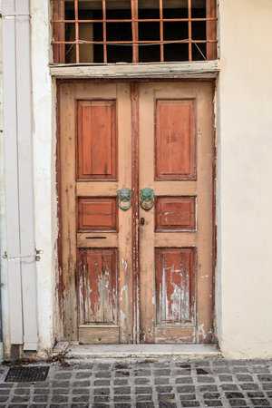 Old wooden door in Greece. Travel and architecture conceptの写真素材