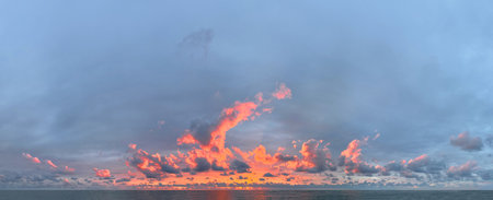 Blue sky with colorful sunrise cloud, nature skyline backgroundの写真素材