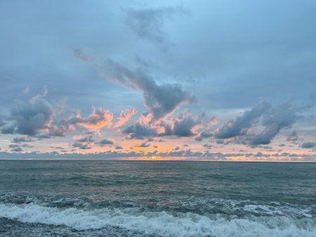 Beautiful red and blue sky with seaの写真素材
