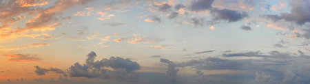 Pastel color sky with colorful cloud. Panoramic twilight skyline horizon cloudscape travel backgroundの写真素材