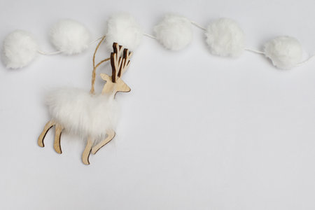 Christmas decoration handmade wodden reindeer on white backgroundの写真素材