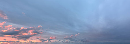 Dinamic sunset sky with cloud and colorful sun ligth, weather skyline backgroundの写真素材
