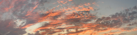 Beautiful sky. Bright colorful cloud on night sky with sun lightの写真素材