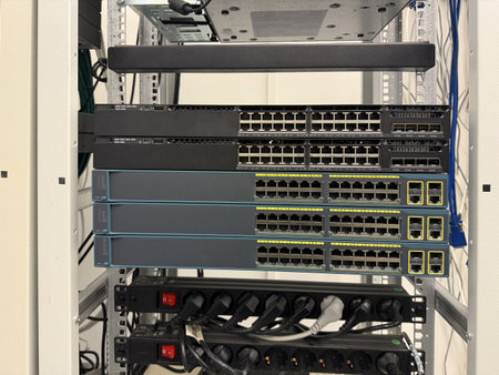 Close-up of racks and network cables. Infrastructure, networking, and data storage. Network technologyの写真素材