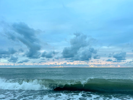 Blue sea wave and cloudy sky. beautiful nature backgroundの写真素材