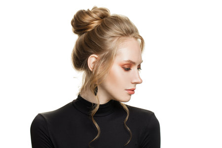 Fashionable young adult woman with perfect hairstyle and make-up fashion beauty portraitの写真素材