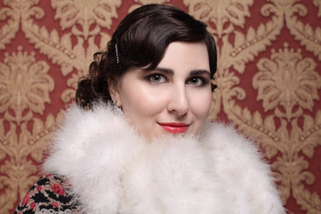 Fashionable brunette woman retro style fashion beauty portraitの写真素材