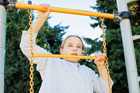 Playing young girl outdoors. Portrait of child 10 years old