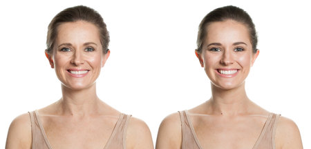 Beautiful female face on white background. Young and mature adult model woman with healthy and wrinkled skin. Cosmetology, medicine, anti aging and beauty conceptの写真素材