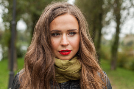 Attractive young woman portrait outdoorsの写真素材