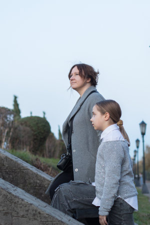 Portrait of mother and daughter outdoors together. Family lifestyle portraitの写真素材