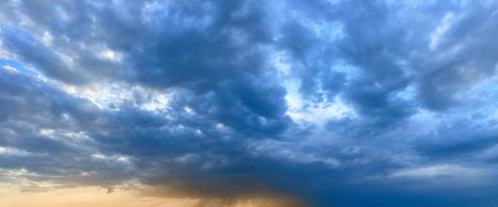Weather landscape. Dark blue clouds on dramatic sky