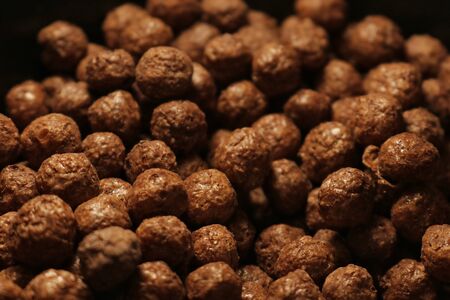 lots of little round brown chocolate flakes