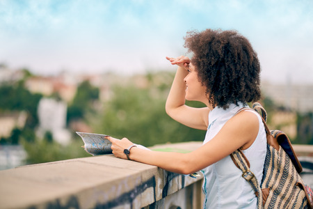 Mixed race tourist exploring new cityの写真素材
