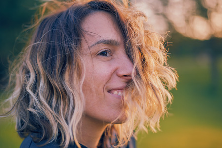 Portrait of a woman against green backgroundの写真素材