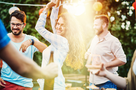 group of friends making a party, have fun togetherの写真素材