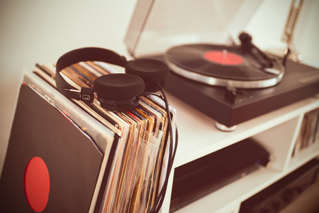 Analog Stereo Turntable Vinyl Record Player. Vinyl collection. Headphones