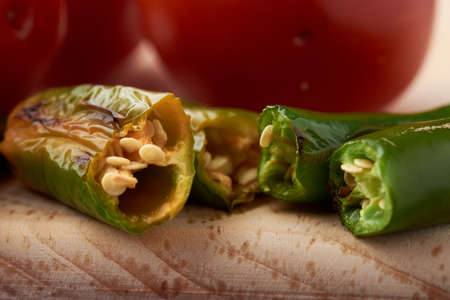 Tomatoes, chillies, placed on a Woodの写真素材