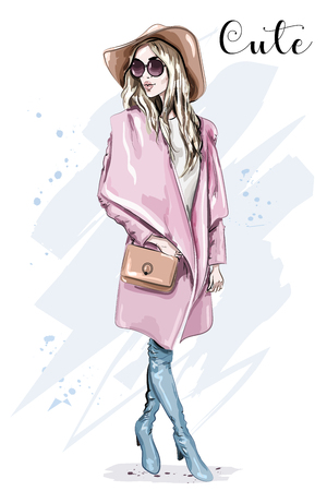 Beautiful young woman in coat and hat. Stylish clothing outfit. Fashion look. Sketch. Vector illustration.のイラスト素材
